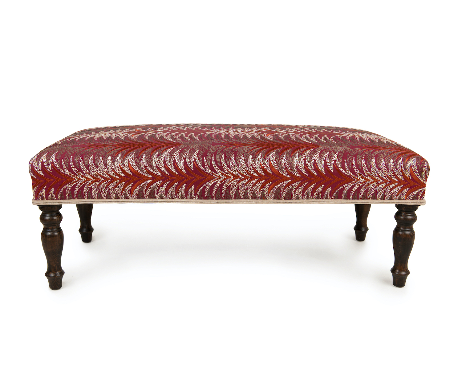 Striking Roll Top Footstool with Double Piping and Turned Legs